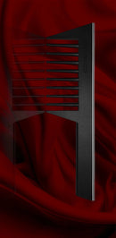 A sophisticated, professional-grade detangling hair comb by Joseph Orozco, crafted with precision for effective styling. Its sleek design ensures smooth gliding through hair, ideal for use with various styling products. The comb is presented against a backdrop of rich red satin, highlighting its premium status among pro hair tools.